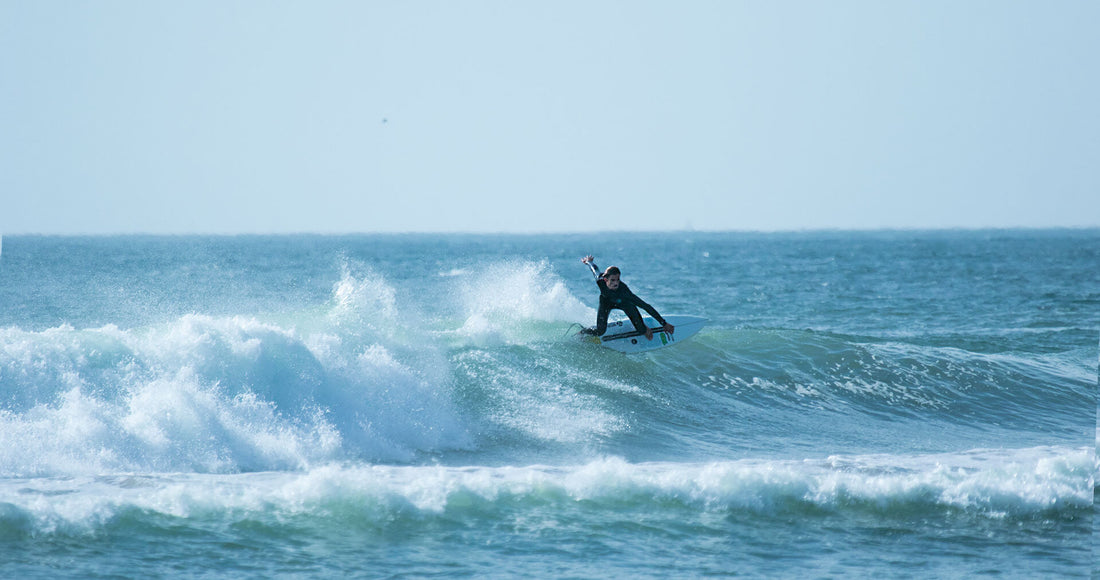 Diogo surfing with front foot traction pads from Van der Waal