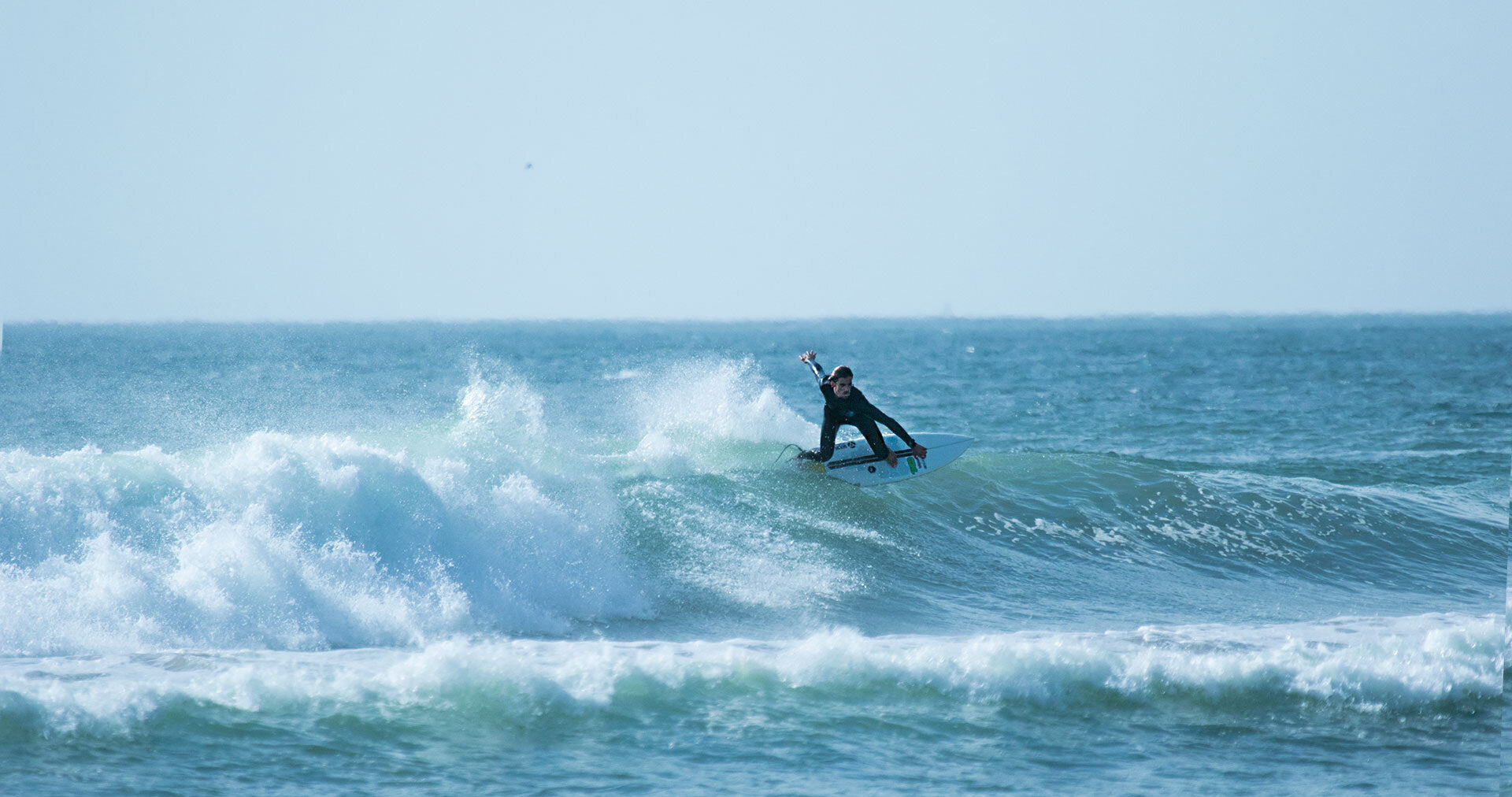 Diogo surfing with front foot traction pads from Van der Waal