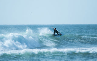 Diogo surfing with front foot traction pads from Van der Waal