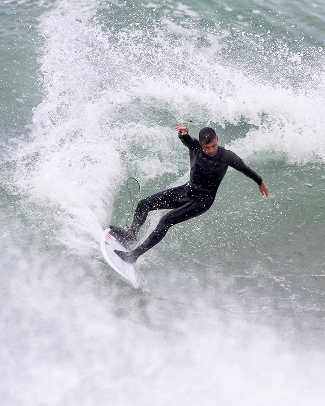 Surf traction pads for surfboards