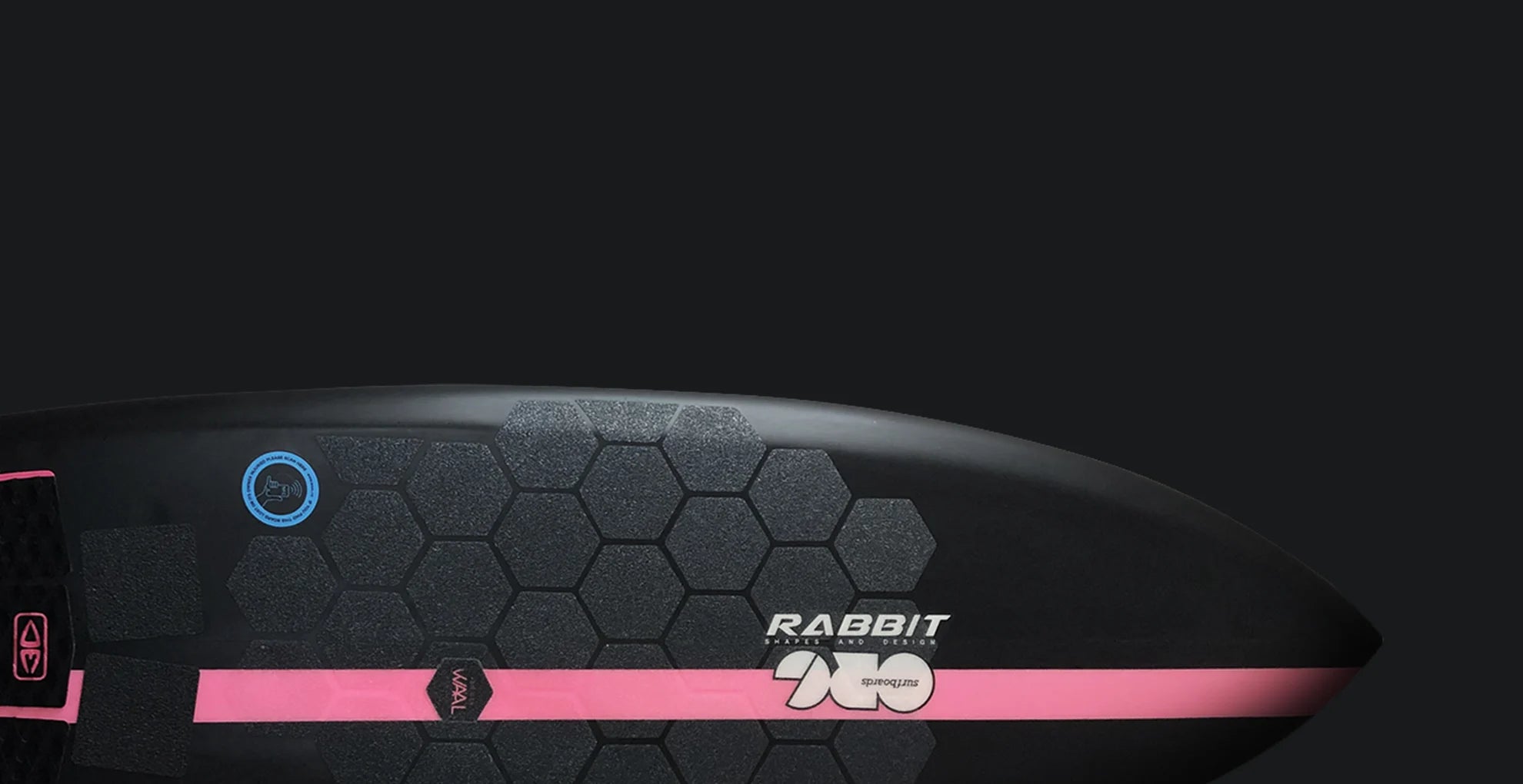 Black and pink surfboard with Van der Waal surf grips