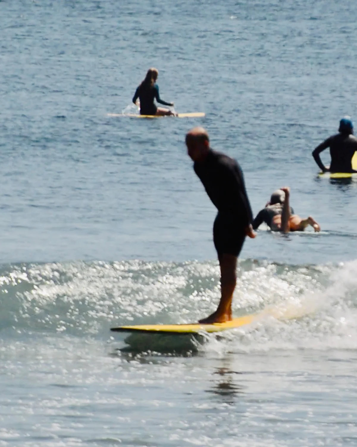 Longboard surfing with front pads