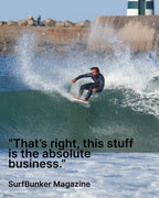 Surfer riding a wave with a quote from SurfBunker Magazine.